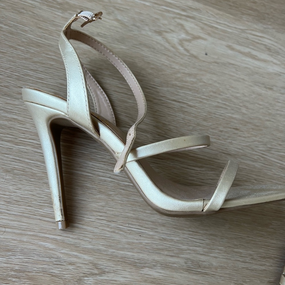 Lulu's gold heels